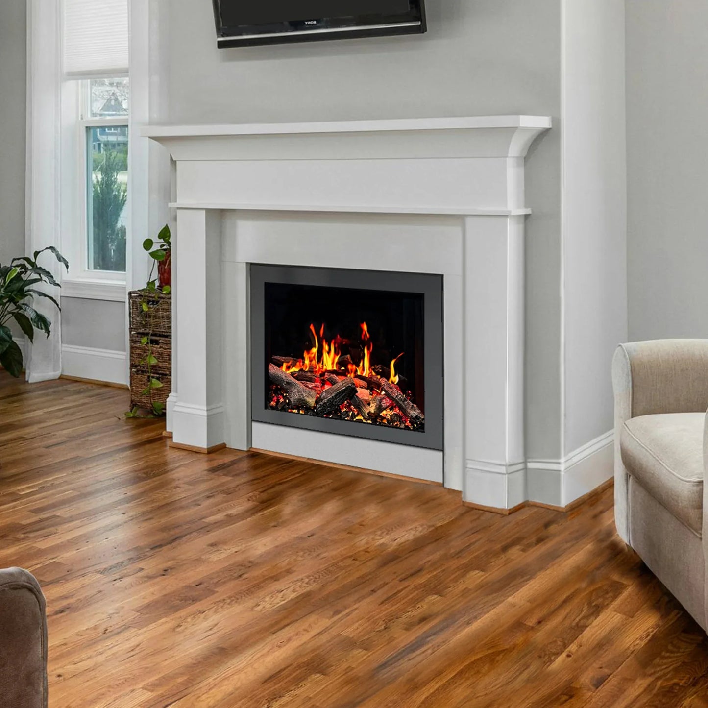 smart 35 inch insert Living room with a white fireplace, wooden floor, and beige armchair.